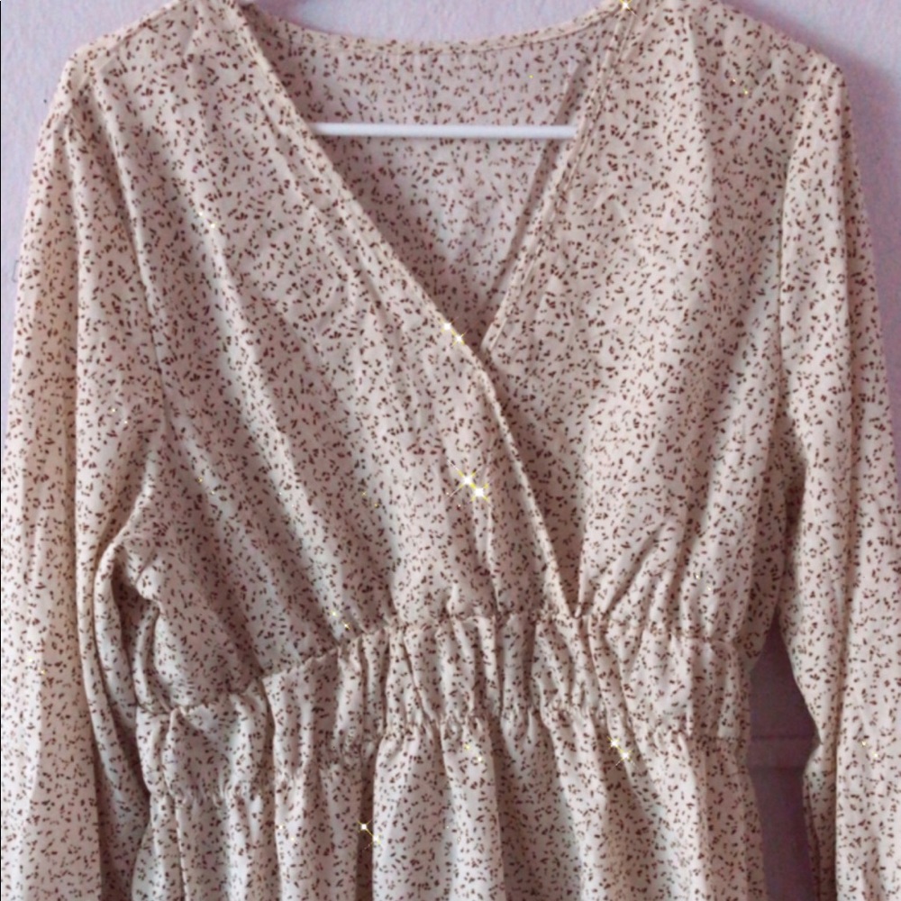 Beige and floral blouse